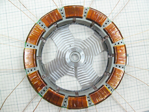 Why not try a high laminating factor with a toroidal coil?