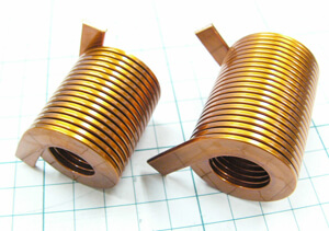 Normal manufacture is three times and over of the wire width but the coil on the left is made for twice the size of the wire width. No problem in coating, either.)