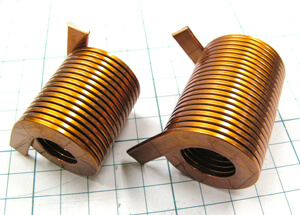 Normal manufacture is three times and over of the wire width but the coil on the left is made for twice the size of the wire width. No problem in coating, either.)