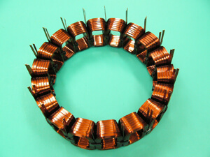 A method of winding to position lead wires of both the start of winding and the end of winding at the circumference of a coil. This eliminates the need for a space to take out the lead wire from inside the coil. The use of the space for winding a copper wire results in a better lamination factor.