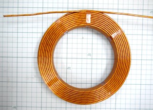 A coil in a copper tube like a pipe(tube) insulated with Kapton, etc.!!